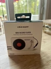 New Crosley Mini Record Player Portable Bluetooth Speaker (model CR3029A-WH). Price: $24.99.