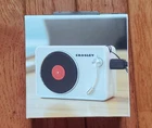 Crosley CR3029A-WH Portable Mini Turntable Bluetooth Speaker, White New. Price: $9.00.