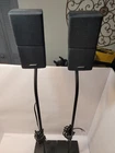 Bose Acoustimass Surround/satellite Speakers Pair Wired Black W/ Stands Used. Price: $74.95.