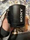 Sony SRS-XB13 Portable Bluetooth Speaker Black With Carrying Strap Usb-c Open. Price: $23.00.