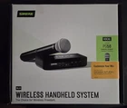 Shure BLX4 Wireless Reciever & BLX2 Microphone Set New. Price: $275.00.
