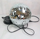 Radio Shack 8 Inch Mirrored Disco Ball With Motor Power Source Spins Slowly Used. Price: $50.00.